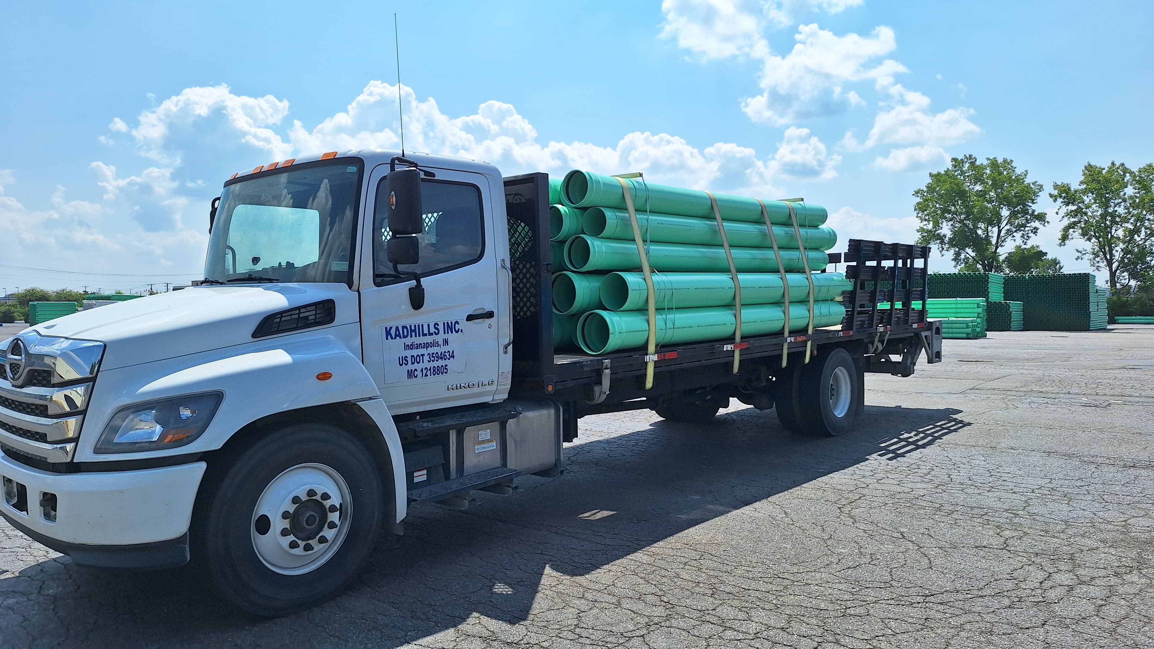 KADHILLS truck hauling pipe